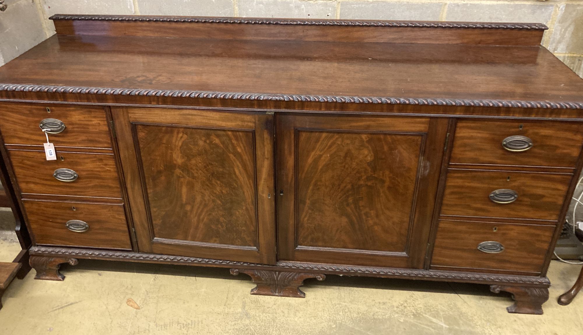 A late 19th/early 20th century Chippendale revival mahogany buffet, length 220cm, depth 61cm, height 100cm